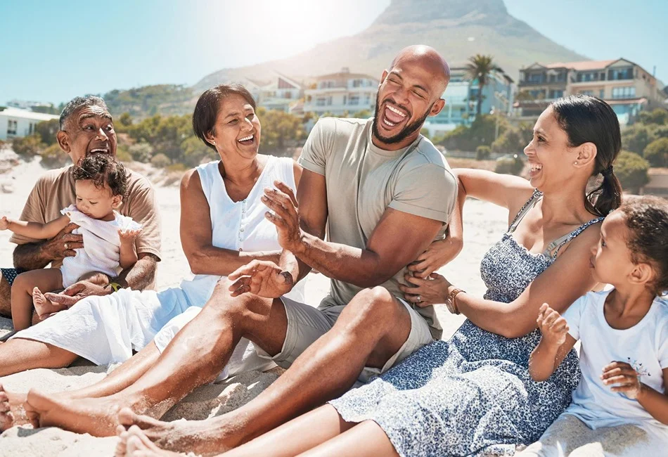 Family Travel Planning Tips family fun on the beach in front of resort or rentals. Photo credit Freepik